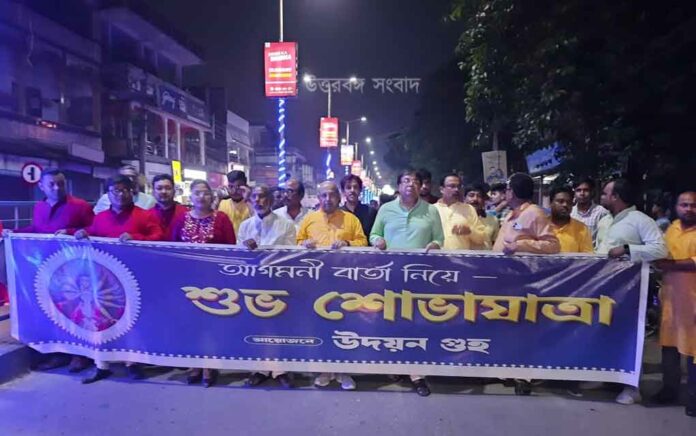 procession with 32 puja committees in Dinhata