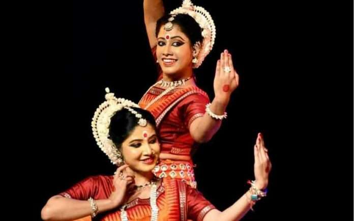 Two girls from North Bengal dance at the Republic Day parade in Delhi