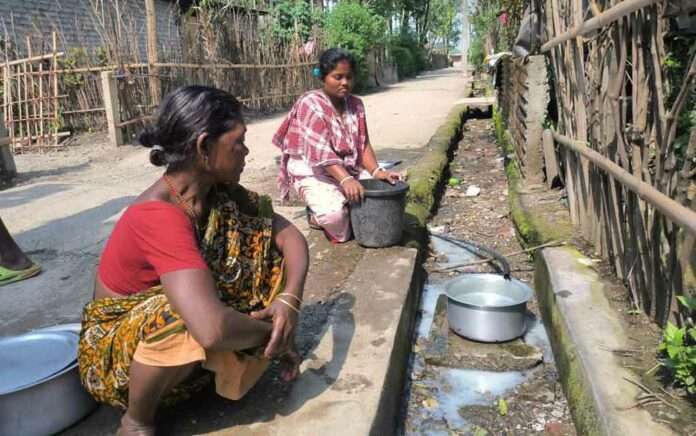 Water crisis Residents are collecting piped water from drains