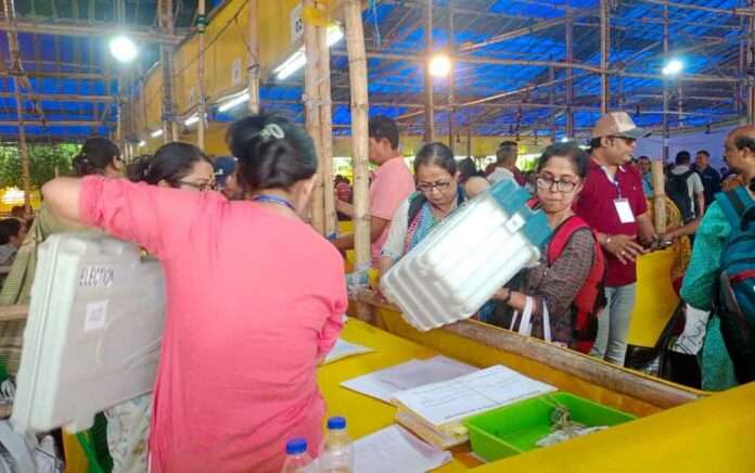Polling workers going to the booth, women happy to get job