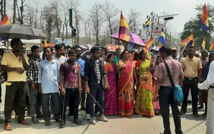 Adivasi organizations are protesting to demand the arrest of the accused of beating and molesting the woman