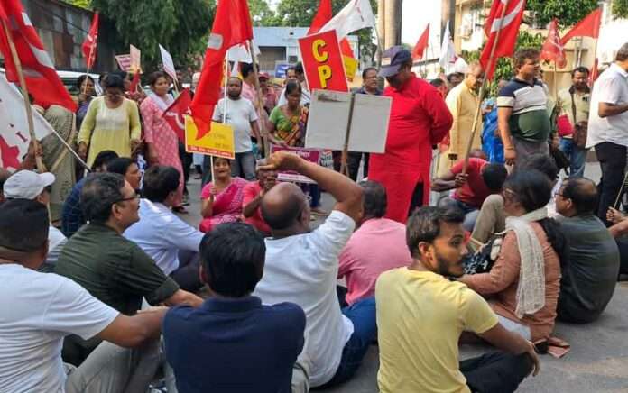 CPM leaders and workers are protesting the increase in electricity tariff